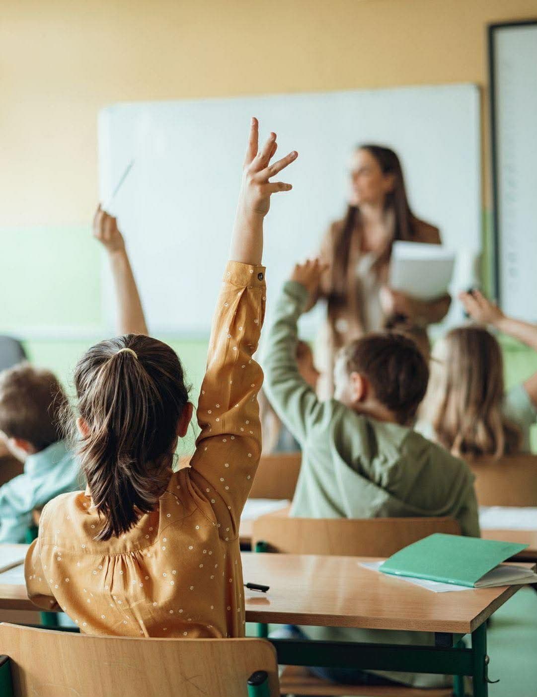 Asian children learning in an English classroom